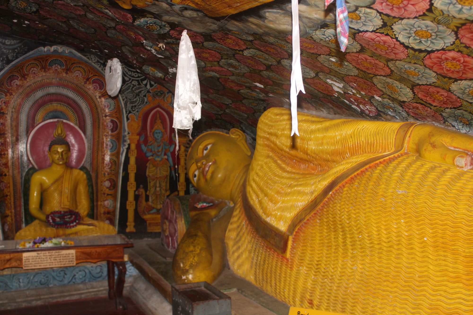 The large reclining Buddha statue in Matale Aluviharaya rock cave temple in Sri Lanka